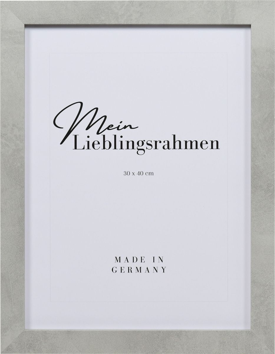 Vue de face d'un cadre photo en bois couleur béton, au design industriel. Son profil carré et sa surface rugueuse en font ton MonCadrePréféré idéal.